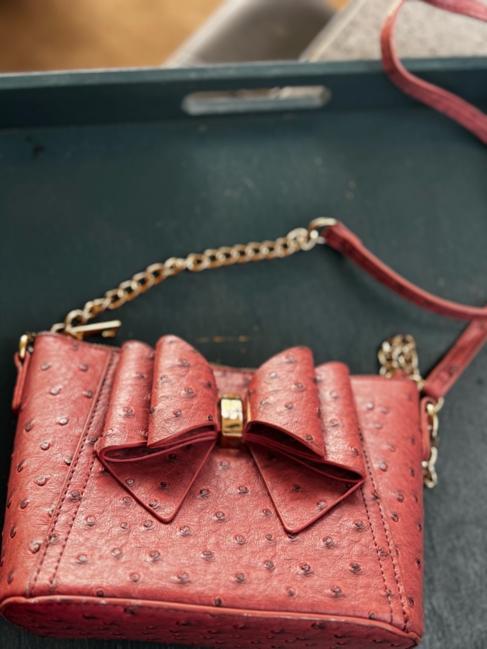 Red Bow-Accent Crossbody Bag with Gold Chain Strap